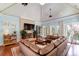 Bright living room with sectional sofa and fireplace at 633 Barbados Dr, Charleston, SC 29492