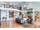 Two story living room with hardwood floors and fireplace at 633 Barbados Dr, Charleston, SC 29492