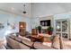 Spacious living room with large sectional sofa and fireplace at 633 Barbados Dr, Charleston, SC 29492