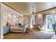 Large main bedroom with sitting area and access to patio at 633 Barbados Dr, Charleston, SC 29492