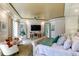 Main bedroom with large bed, TV and sitting area at 633 Barbados Dr, Charleston, SC 29492