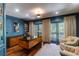 Spacious home office with hardwood floors and blue walls at 633 Barbados Dr, Charleston, SC 29492