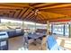 Covered outdoor kitchen and dining area with water views at 633 Barbados Dr, Charleston, SC 29492