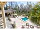 Luxury pool and patio area with ample seating and outdoor kitchen at 633 Barbados Dr, Charleston, SC 29492