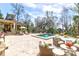 Inviting pool area with lounge chairs and beautiful landscaping at 633 Barbados Dr, Charleston, SC 29492