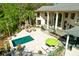 Stunning pool and patio area with outdoor fireplace and seating at 633 Barbados Dr, Charleston, SC 29492