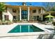 Inviting rectangular pool with a spacious patio and home views at 633 Barbados Dr, Charleston, SC 29492