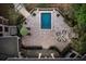 Overhead view of a luxurious pool and patio area with lounge chairs and a fireplace at 633 Barbados Dr, Charleston, SC 29492