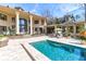 Stunning turquoise pool with patio and home views at 633 Barbados Dr, Charleston, SC 29492