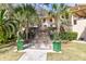 Stone staircase leading to home with lush landscaping at 633 Barbados Dr, Charleston, SC 29492