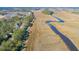 An aerial view showcasing the community surrounded by winding creeks at 1556 John Fenwick Ln, Johns Island, SC 29455