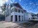 Home featuring a covered porch, and great curb appeal at 1556 John Fenwick Ln, Johns Island, SC 29455
