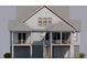Two-story home with covered porches and attached garage at 3806 Cameron Blvd, Isle of Palms, SC 29451
