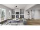 Spacious living room with fireplace, built-ins and hardwood floors at 3806 Cameron Blvd, Isle of Palms, SC 29451