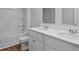 A bathroom features a double sink vanity and a shower-tub combo at 142 Morning View Way, Moncks Corner, SC 29461