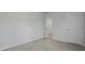 A bedroom features neutral walls, carpeted flooring, and two doors at 142 Morning View Way, Moncks Corner, SC 29461