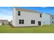Bright backyard featuring a well-manicured lawn, with ample space for outdoor activities and entertainment at 148 Morning View Way, Moncks Corner, SC 29461