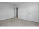 This bedroom has neutral carpet, gray walls, and white doors at 148 Morning View Way, Moncks Corner, SC 29461