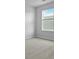 This bedroom has a window with views of the outdoors at 148 Morning View Way, Moncks Corner, SC 29461