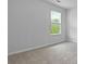 This bedroom has a window with views of the outdoors at 148 Morning View Way, Moncks Corner, SC 29461