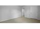This bedroom has neutral carpet, gray walls, and white doors at 148 Morning View Way, Moncks Corner, SC 29461