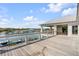 Wooden deck overlooking harbor with covered seating area and a serene atmosphere at 34 Waterway Island Dr, Isle of Palms, SC 29451