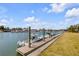 This waterfront property features a private dock, boat lift, and easy access to boating and water activities at 34 Waterway Island Dr, Isle of Palms, SC 29451