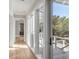 Hallway offers seamless indoor-outdoor living with access to a deck and beautiful views of the greenery at 34 Waterway Island Dr, Isle of Palms, SC 29451