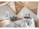 Inviting living area with vaulted ceilings, exposed wood beams, light hardwood floors, and a comfortable sectional sofa at 34 Waterway Island Dr, Isle of Palms, SC 29451