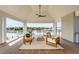 Inviting covered outdoor area with comfortable seating and stunning harbor views at 34 Waterway Island Dr, Isle of Palms, SC 29451