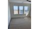 Bright bedroom featuring a large window with scenic marsh views at 1560 John Fenwick Ln, Johns Island, SC 29455