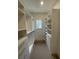Spacious walk-in closet with custom shelving and storage for organized living at 1560 John Fenwick Ln, Johns Island, SC 29455