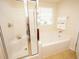 Spa-like bathroom with soaking tub and walk-in shower at 8897 Cat Tail Pond Rd, Summerville, SC 29485