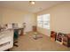 Large bedroom with carpeted floors and plenty of natural light at 8897 Cat Tail Pond Rd, Summerville, SC 29485