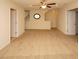 Large bonus room with wall-to-wall carpeting and ceiling fan at 8897 Cat Tail Pond Rd, Summerville, SC 29485