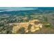 Aerial view of new homes under construction in a wooded area near the water at 132 Morning View Way, Moncks Corner, SC 29461
