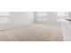 Spacious loft area with neutral carpet and multiple windows at 132 Morning View Way, Moncks Corner, SC 29461