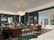 Relaxing club room with leather sofas and game tables at 609 King St # 704, Charleston, SC 29403