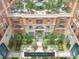 Aerial view of courtyard with pool and lounge areas at 609 King St # 704, Charleston, SC 29403