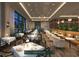 Elegant fine dining room with upscale tables, chairs, and chandeliers at 609 King St # 704, Charleston, SC 29403