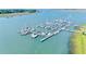 Aerial view of a full-service marina with numerous boats and slips at 18 W Mariners Cay Dr, Folly Beach, SC 29439
