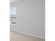 Bedroom with neutral carpet, a window, and an electrical outlet in a white wall at 159 Morning View Way, Moncks Corner, SC 29461