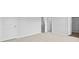 Neutral carpet leads to a bathroom, with a shower and a door to another bedroom at 159 Morning View Way, Moncks Corner, SC 29461