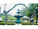 Close up of a fountain featuring statues of children holding flowers in a small town at 159 Morning View Way, Moncks Corner, SC 29461