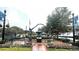 Artistic fountain sculpture of children in a charming town square with benches at 159 Morning View Way, Moncks Corner, SC 29461
