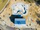 Aerial view of community pool and clubhouse under construction at 1636 Siloh St # 478, Mount Pleasant, SC 29466