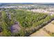 Aerial view of wooded lot near new homes at 1636 Siloh St # 478, Mount Pleasant, SC 29466