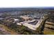 Aerial view of new home construction, featuring a pond and surrounding landscape at 1636 Siloh St # 478, Mount Pleasant, SC 29466
