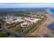 Aerial view of new homes and a large area of land near water being developed at 1636 Siloh St # 478, Mount Pleasant, SC 29466