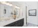 Bathroom features double vanity, frameless shower, and patterned floor at 1636 Siloh St # 478, Mount Pleasant, SC 29466